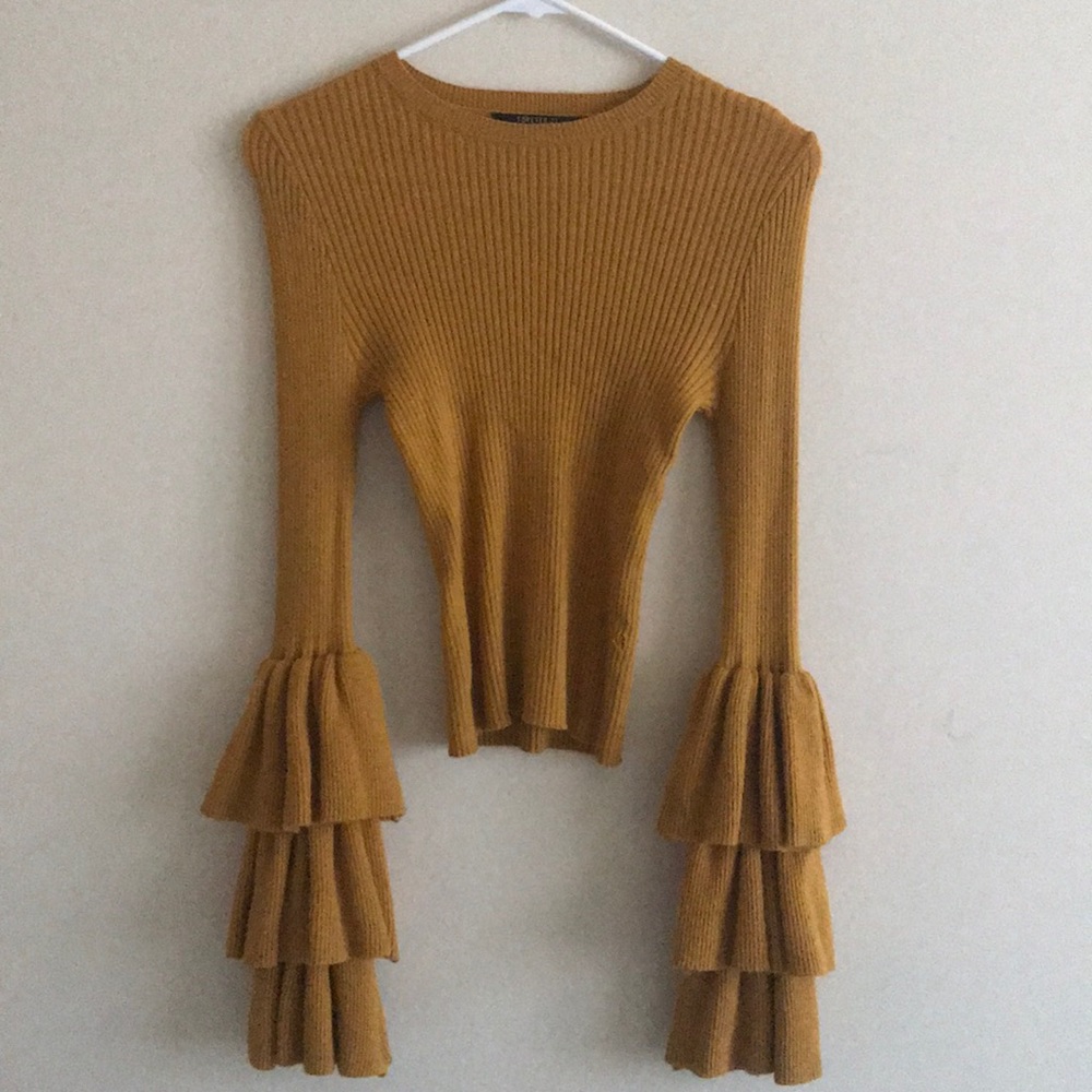 Cute Yellow top with ruffles on the arm